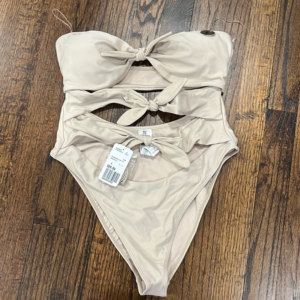 Never worn with tags - tan tie front / bow bathing suit - one piece